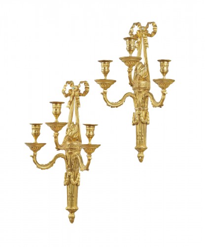 Pair of wrapped three arms of light in chased and gilt bronze