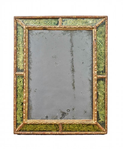 Eglomised glass mirror with interlacing decoration