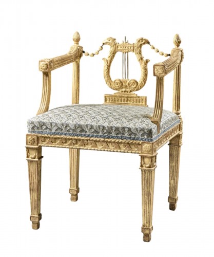 Openwork lyre-back armchair