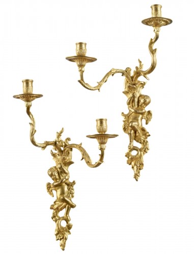 Pair of wall lights with two arms adorned with Putti