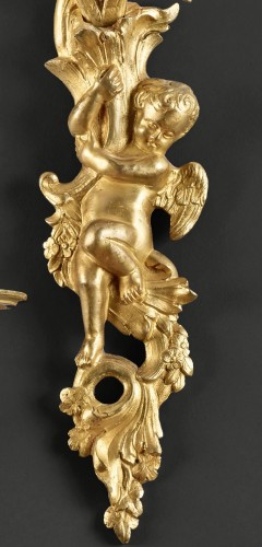 Pair of wall lights with two arms adorned with Putti - Lighting Style French Regence