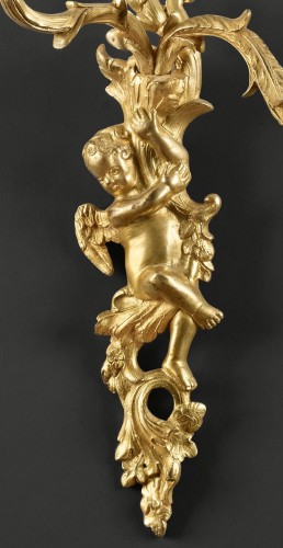 Lighting  - Pair of wall lights with two arms adorned with Putti