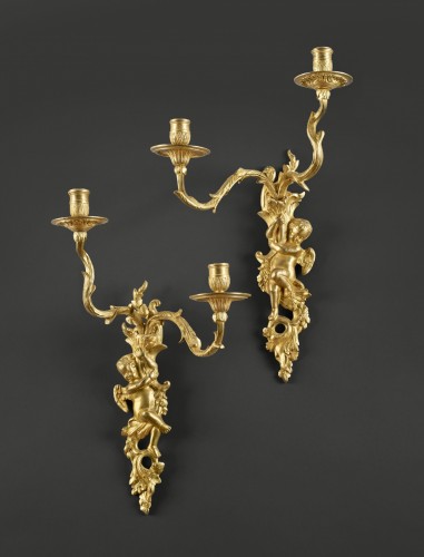 Pair of wall lights with two arms adorned with Putti - 