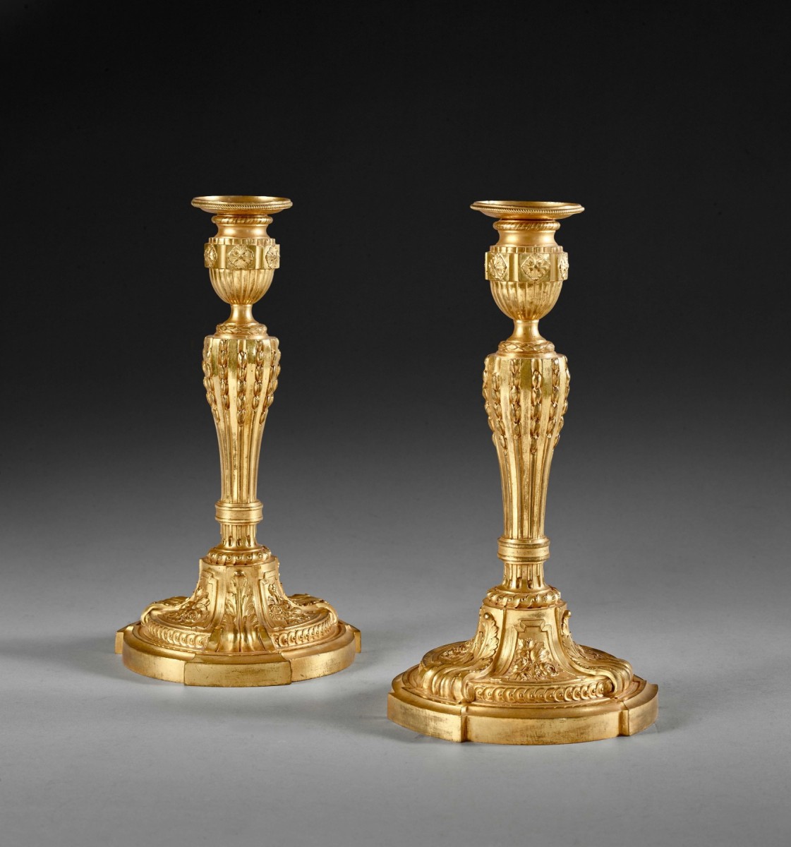 Past auction: A pair of large French Louis Philippe ormolu candlesticks  circa 1830-1840