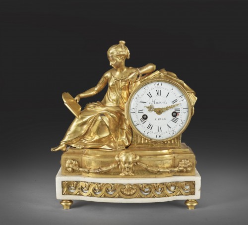 A mantel clock representing a figure of Prudence - 