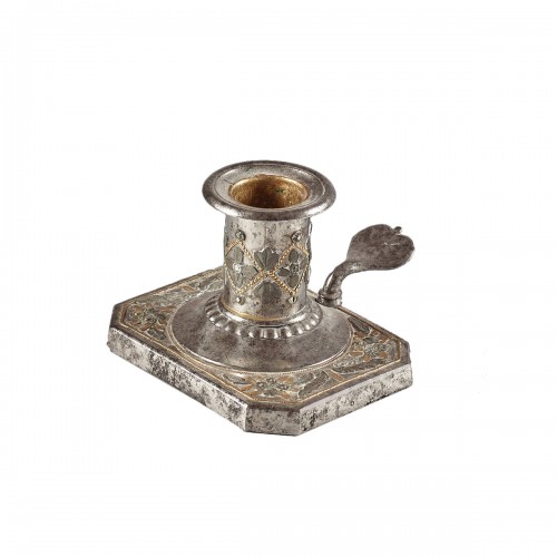 Candleholder in polished steel enhanced with brass and pewter