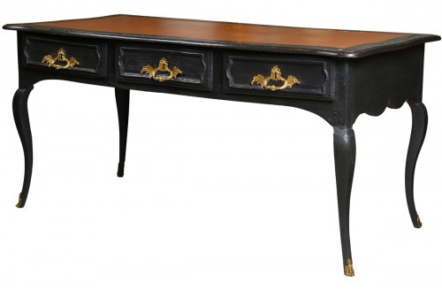 A black lacquered oak bureau Plat, France early 19th century