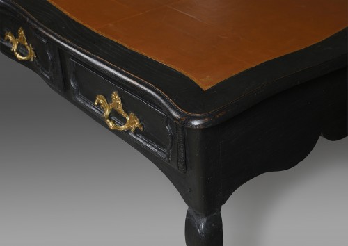 Furniture  - A black lacquered oak bureau Plat, France early 19th century