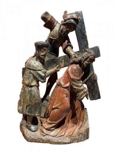 Carved wooden group presenting the carrying of the cross