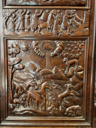 Sumene armoire depicting the creation of the word - 