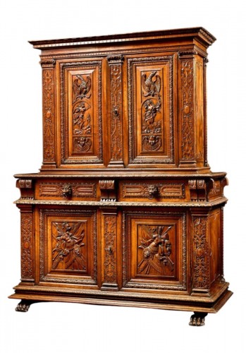Fine french Renaissance walnut cabinet  carved with trophies
