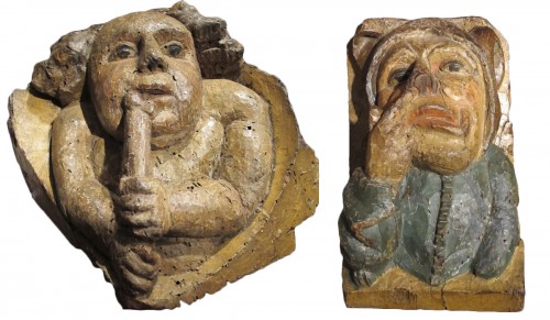 A pair of corbels with audacious subjects from the Middle Ages