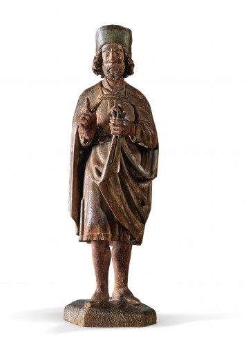 Carved wood representing a blessing holy character