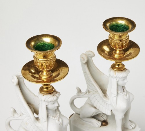 A Pair of Bicuit  andGilt Bronze Sphynxes Candelsticks  - 