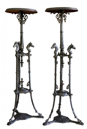 A pair of Stands with Horses, in “Barell Gun” cast iron