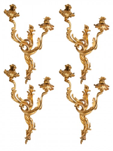 Quatre appliques en bronze doré d'époque Louis XV