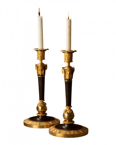 Pair of “claw-foot” candlesticks with antique masks, attr. to Claude Galle
