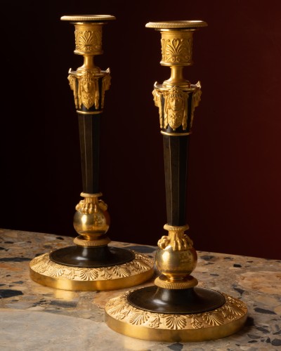 Lighting  - Pair of “claw-foot” candlesticks with antique masks, attr. to Claude Galle