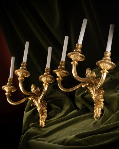 Transition - Set Of Four “Transition” Gilt Bronze Three-light Wall-lights