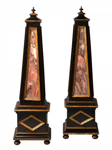 Obelisks in blackened wood and Portasanta marble