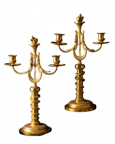 A Pair of Candlesticks with Gilt Serpents and Lyres