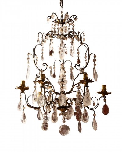 Lustre à six feux en fer martelé et bronze doré