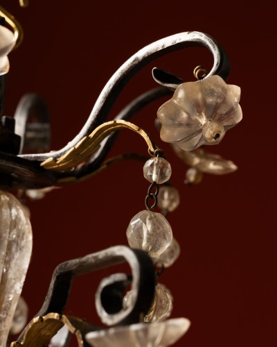 18th century - A Six-light chandelier in hammered iron and gilt bronze