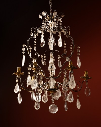 Antiquités - A Six-light chandelier in hammered iron and gilt bronze