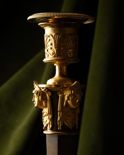 A Set of Four Empire Parcel-Gilt “Claw-Foot” Candlesticks with Antique Mask - 