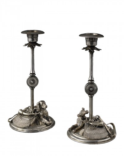 Pair of silvered bronze hunting candlesticks 