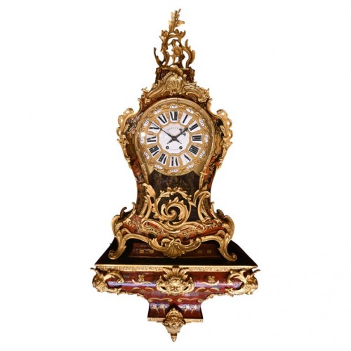 Pendule de cheminée en bronze doré et porcelaine fin du XIXe siècle