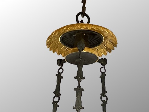 XIXe siècle - Lustre en bronze patiné et doré début du XIXe siècle