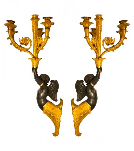 Pair of large Empire-period ormolu and patinated sconces