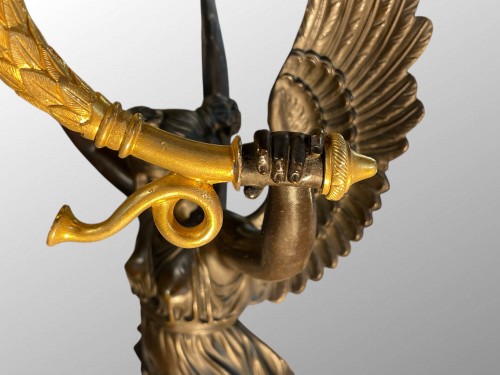 Luminaires Bougeoirs et Chandeliers - Candélabre en bronze doré et patiné, époque Empire