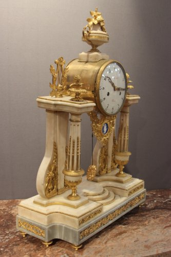 Horology  - Louis XVI marble clock