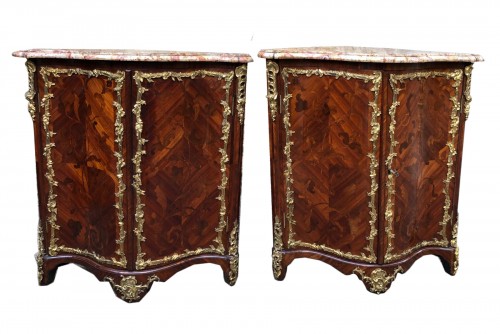 Pair of Regency period corner pieces stamped MIGEON