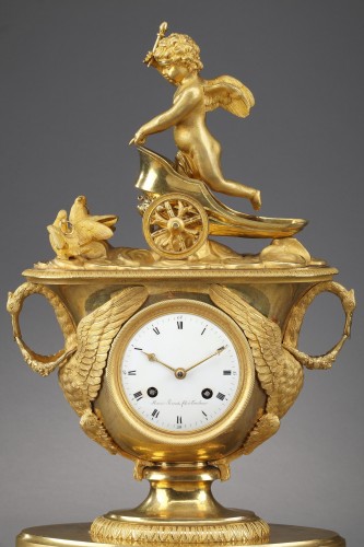 Pendule d'époque Empire avec putto dans un char - Horlogerie Style Empire