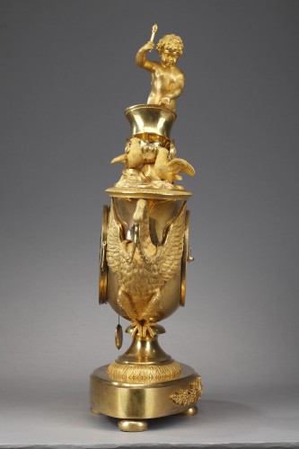 XIXe siècle - Pendule d'époque Empire avec putto dans un char