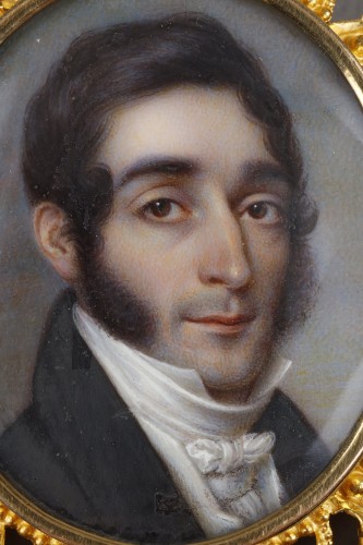 A miniature portrait of a man in a gold frame from the 1st half of the 19th - 