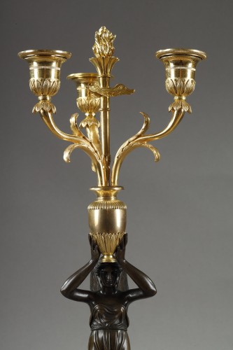Lighting  - A pair of large candelabra featuring winged female figures, early 19th cent