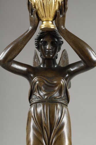 Antiquités - A pair of large candelabra featuring winged female figures, early 19th cent