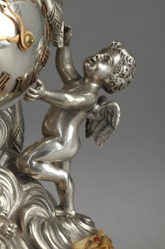Antiquités - Pendule en argent et onyx dans son étui de cuir