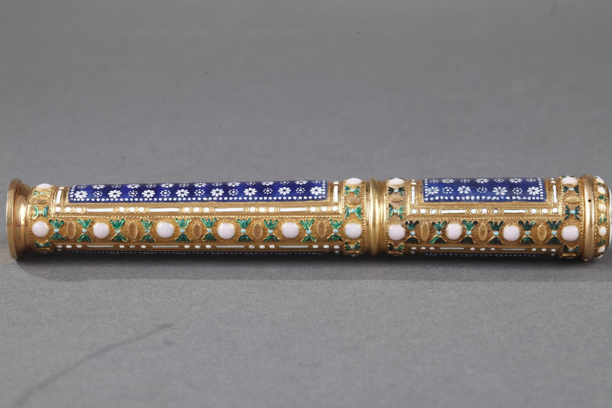 Gold, cylindrical case for wax with translucent blue enamel ...