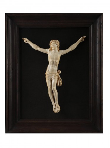 A 18th century carved ivory figure of the crucified christ 