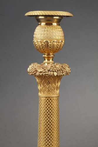 Luminaires Bougeoirs et Chandeliers - Paire de bougeoirs en bronze doré début du XIXe siècle