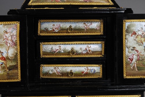 Antiquités - A 19th century Autrian ormolu and enamel-mounted ebony Cabinet.