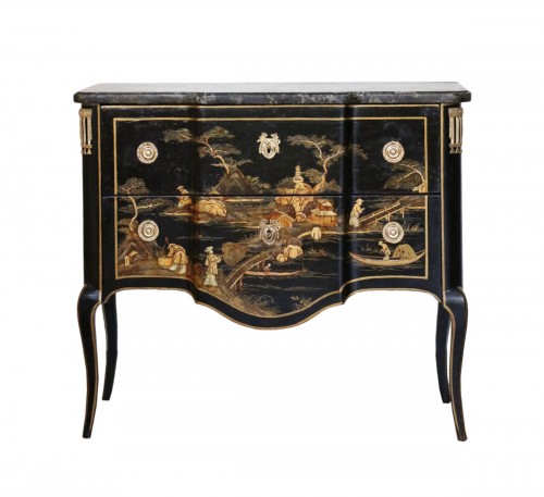 Commode in China gold lacquer on black background