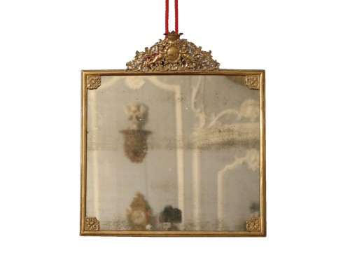 A Louis XIV Rectangular bronze mirror