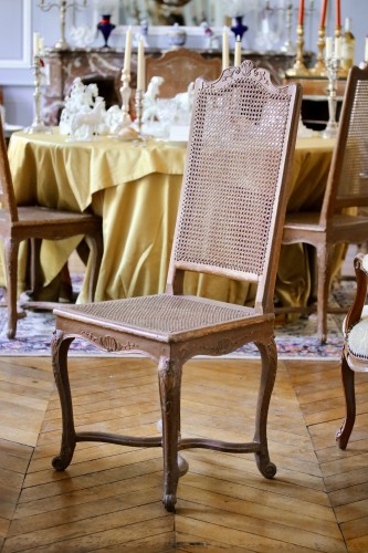 Antiquités - Set of eight Regence caned chairs