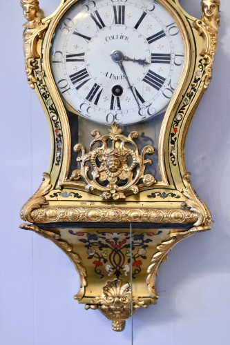 Cartel d'alcôve à tirage aux cinq couleurs - Horlogerie Style Régence